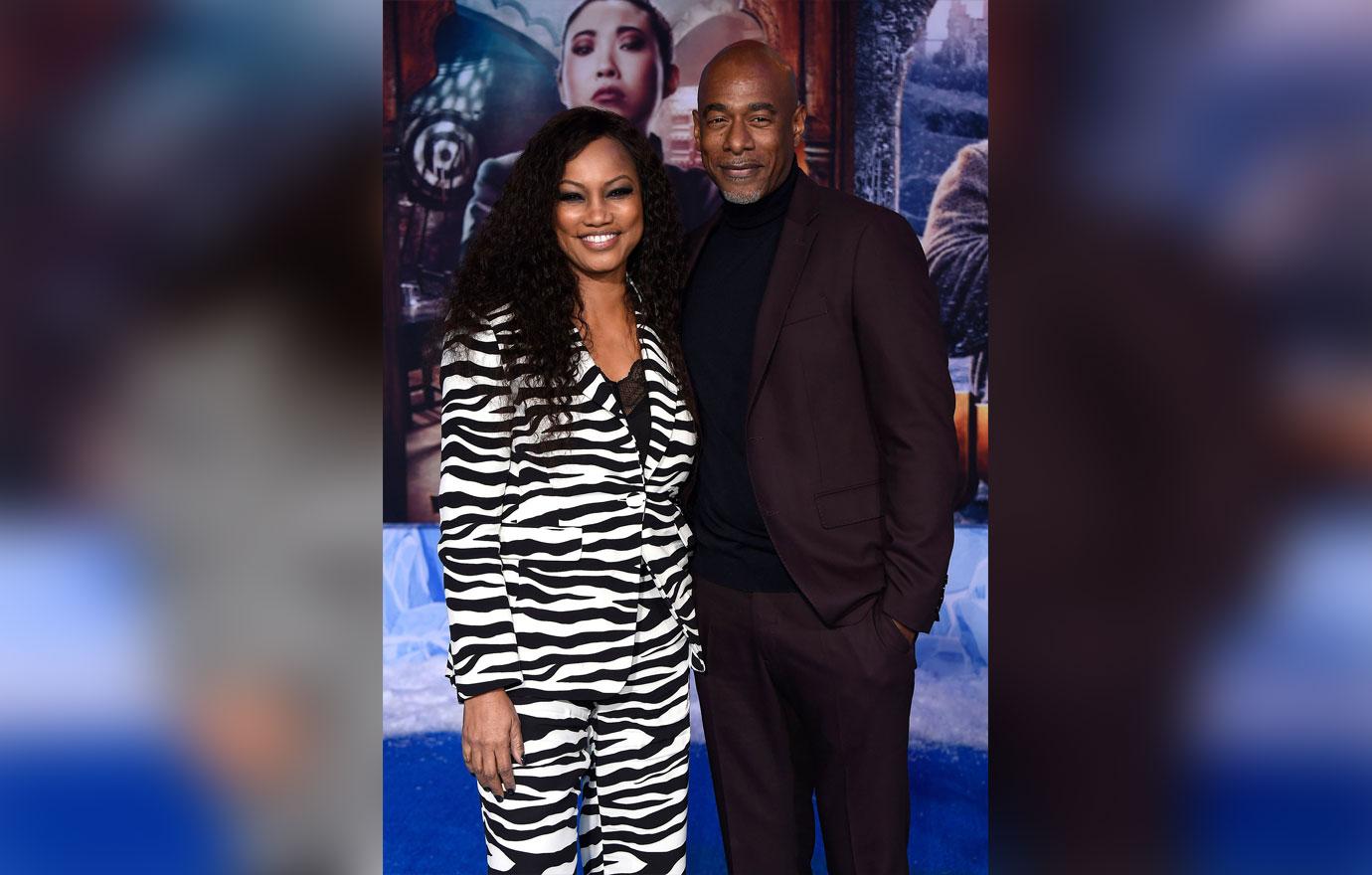 Garcelle Beauvais And Michael Elliot On Red Carpet