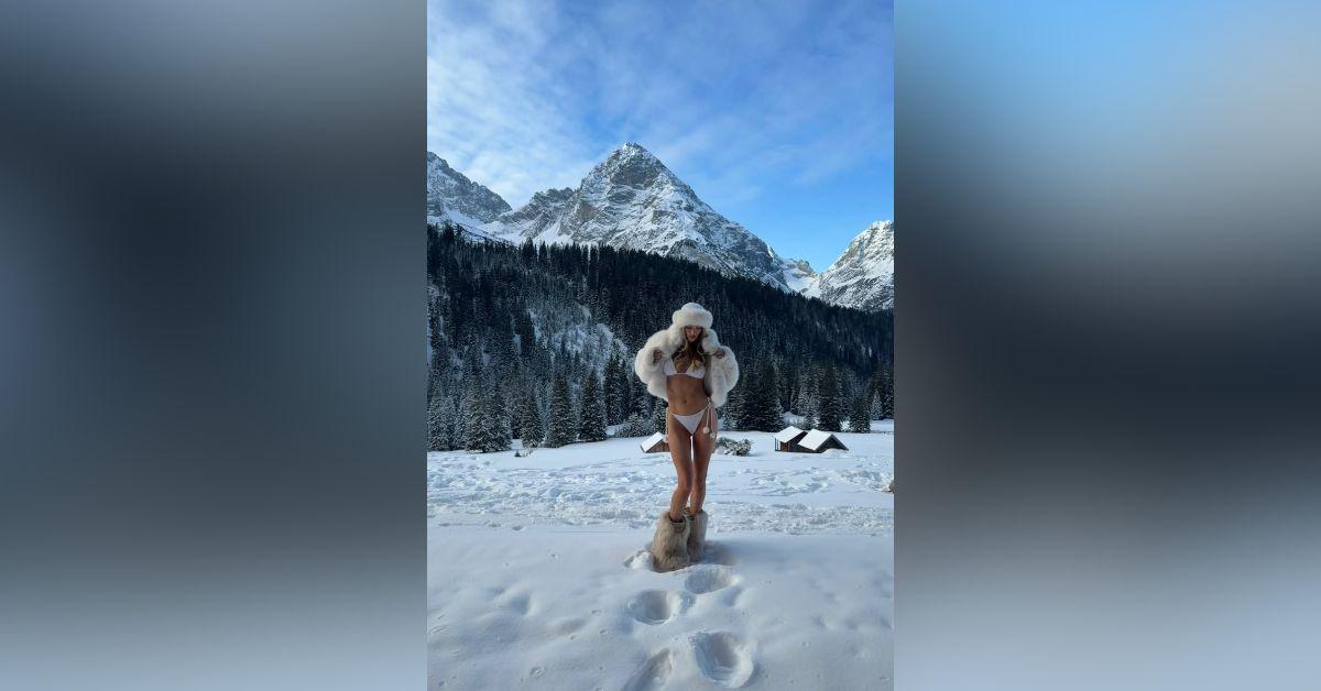 Image of Rosie Huntington-Whiteley stripped down to her bikini in the cold.