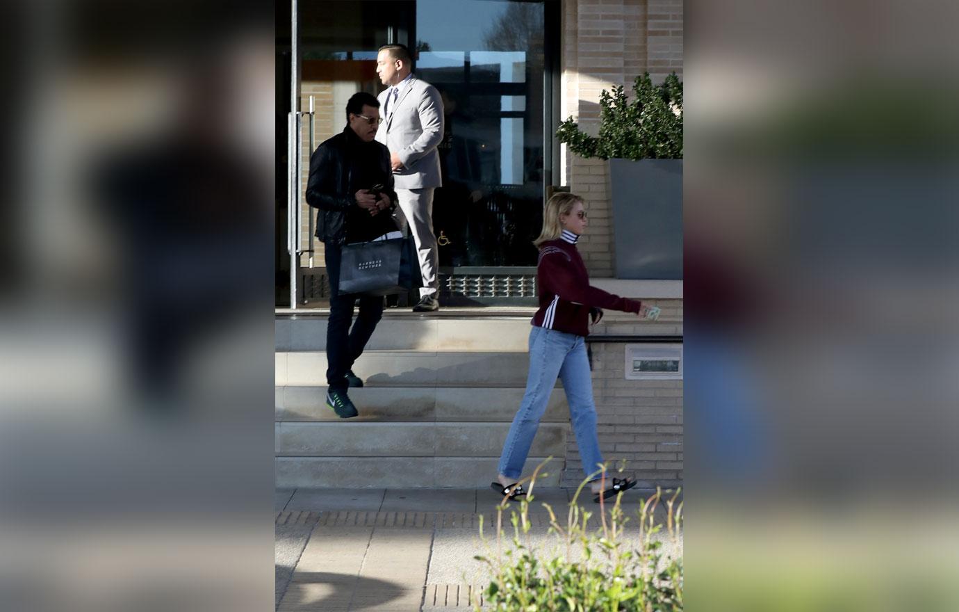 Sofia Richie hangs at Barneys with her dad Lionel Richie