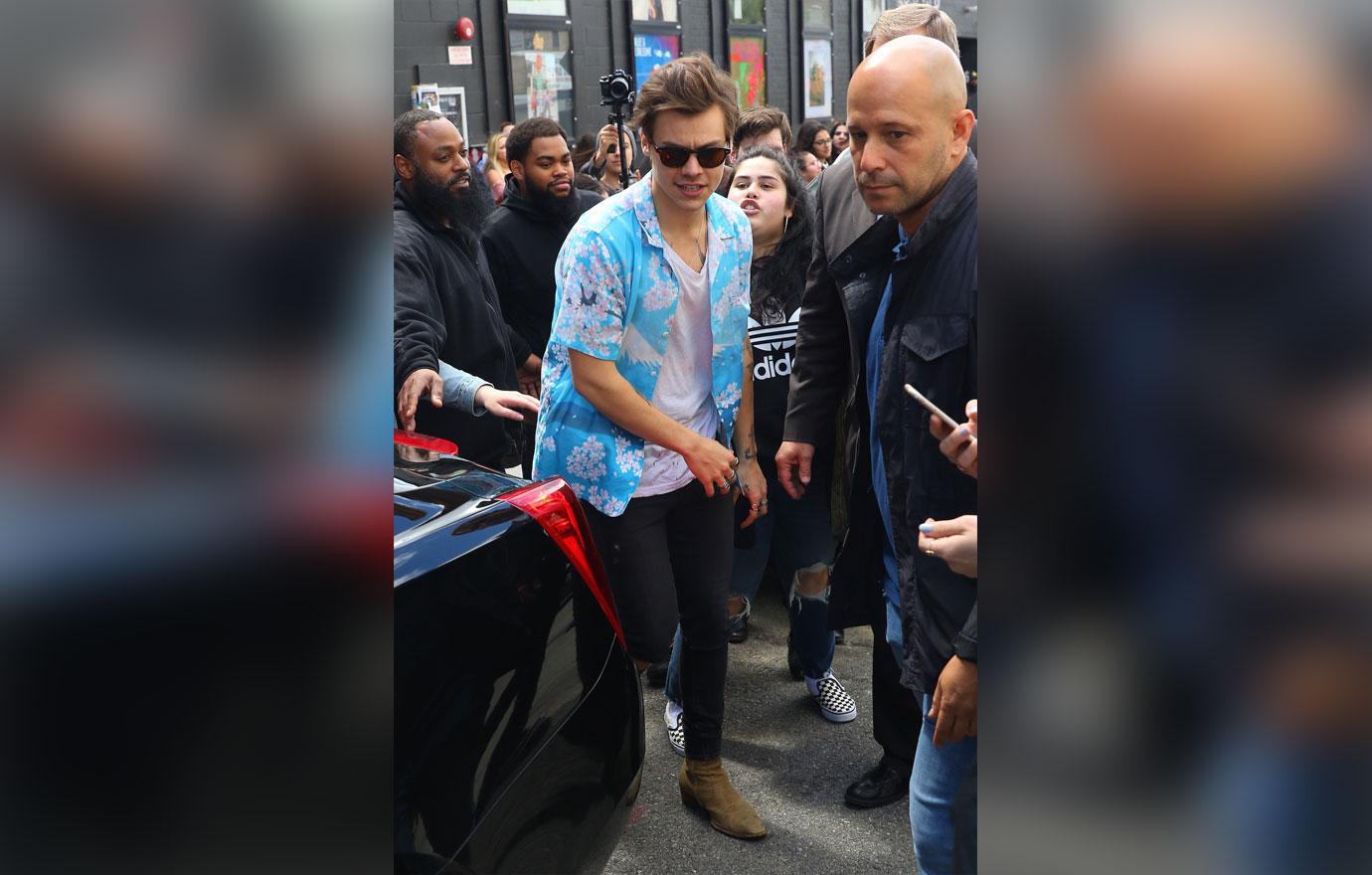 *EXCLUSIVE* Harry Styles greets fans outside of a secret performance venue