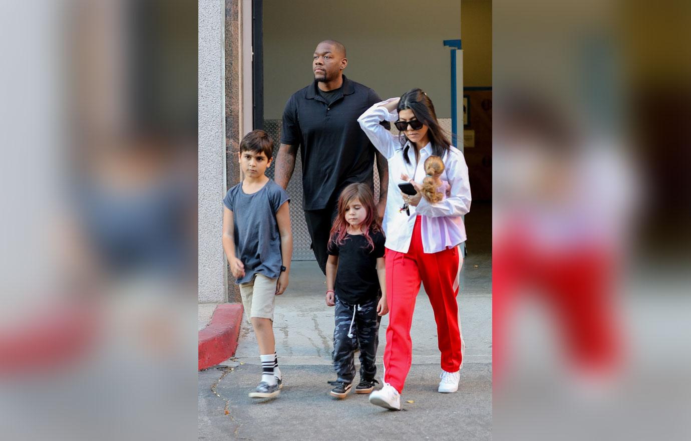 Kourtney Kardashian heads out from art class with Mason and Penelope