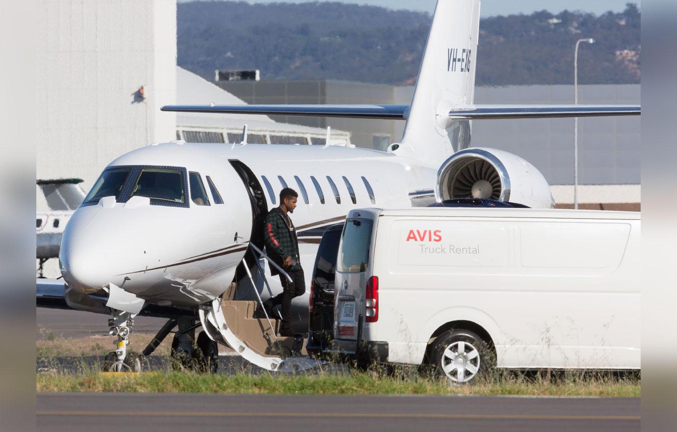 EXCLUSIVE: Usher arrives into  Adelaide in style as he exits private jet hours before his show