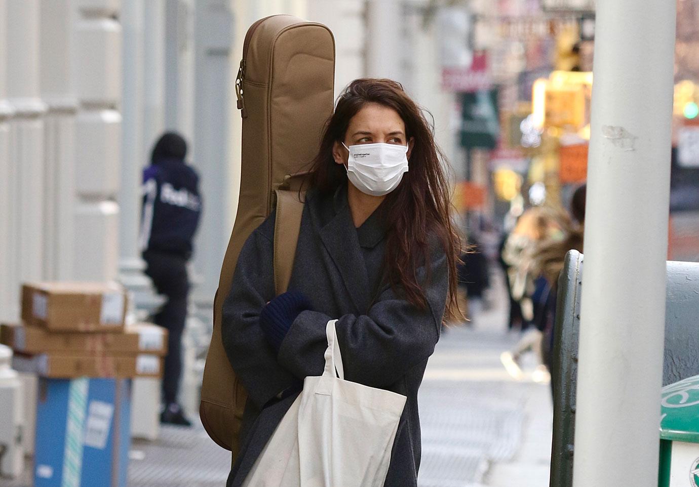 Katie Holmes walking in NY with Guitar