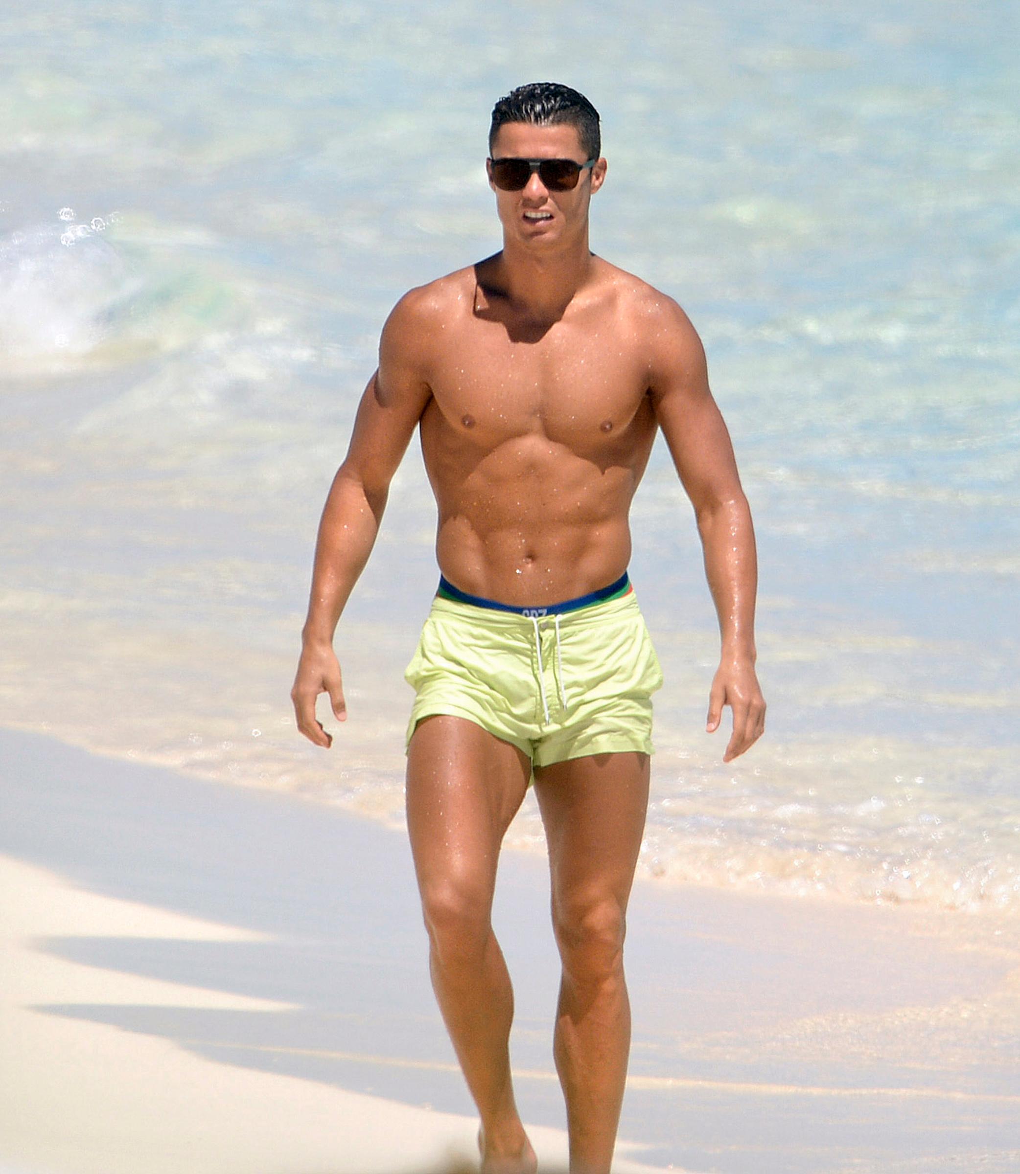 EXCLUSIVE: **PREMIUM EXCLUSIVE** Cristiano Ronaldo and his son have a boys&#8217; day of fun at the beach