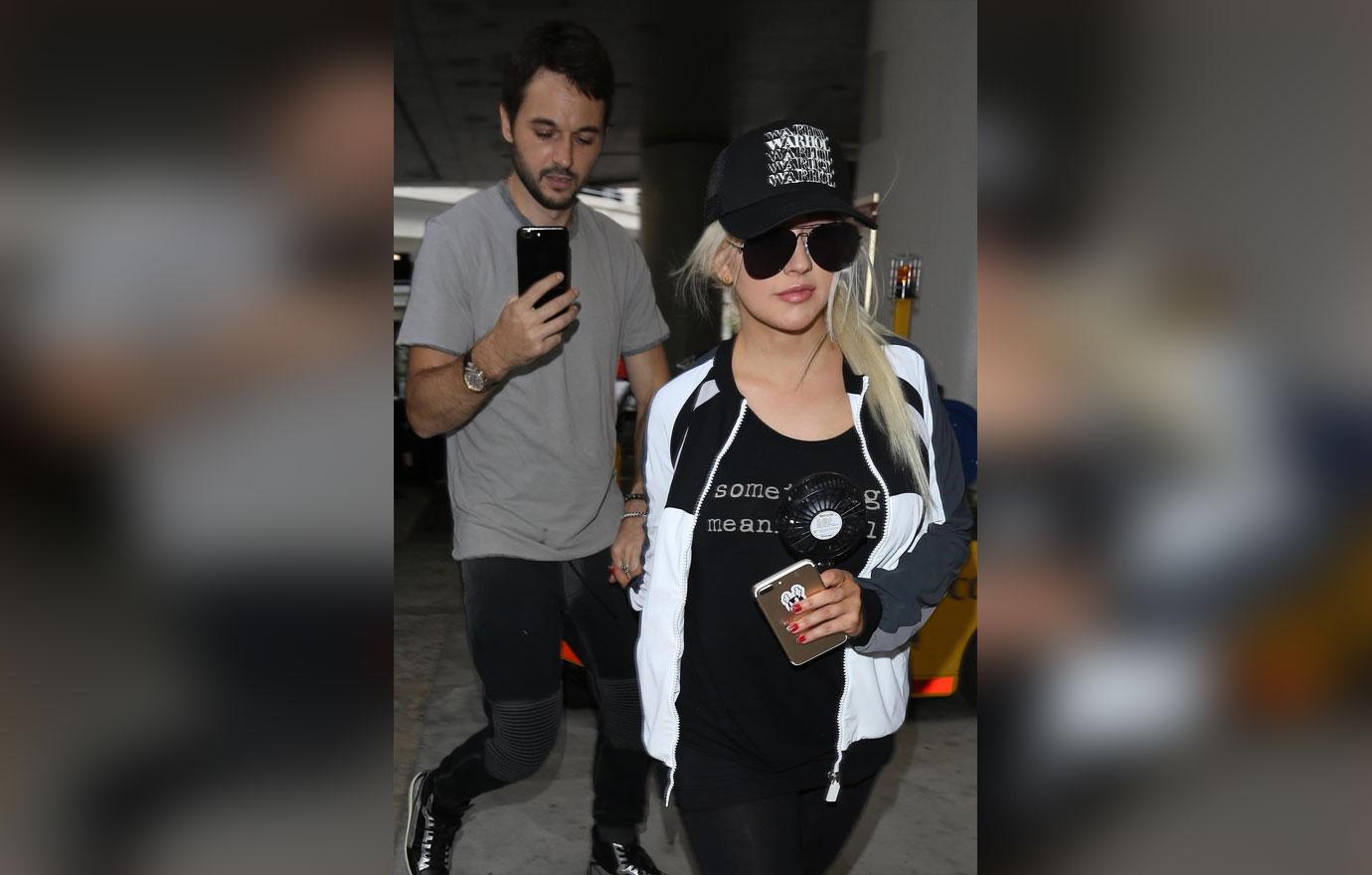 Christina Aguilera and fiance Matthew Rutler arrive at Lax