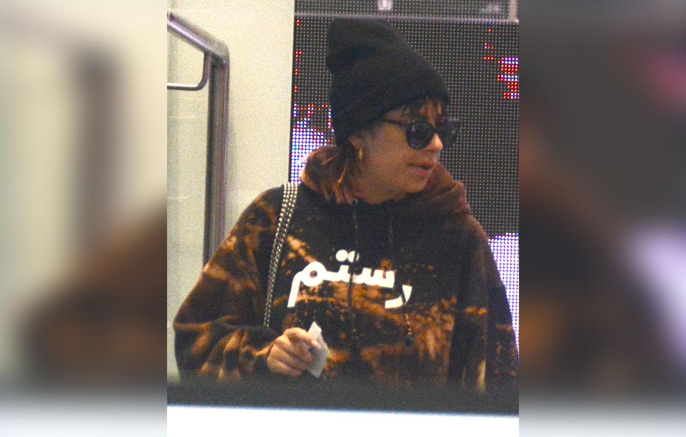 EXCLUSIVE: Charli XCX looks unrecognisable as she goes for a stroll in Sydney