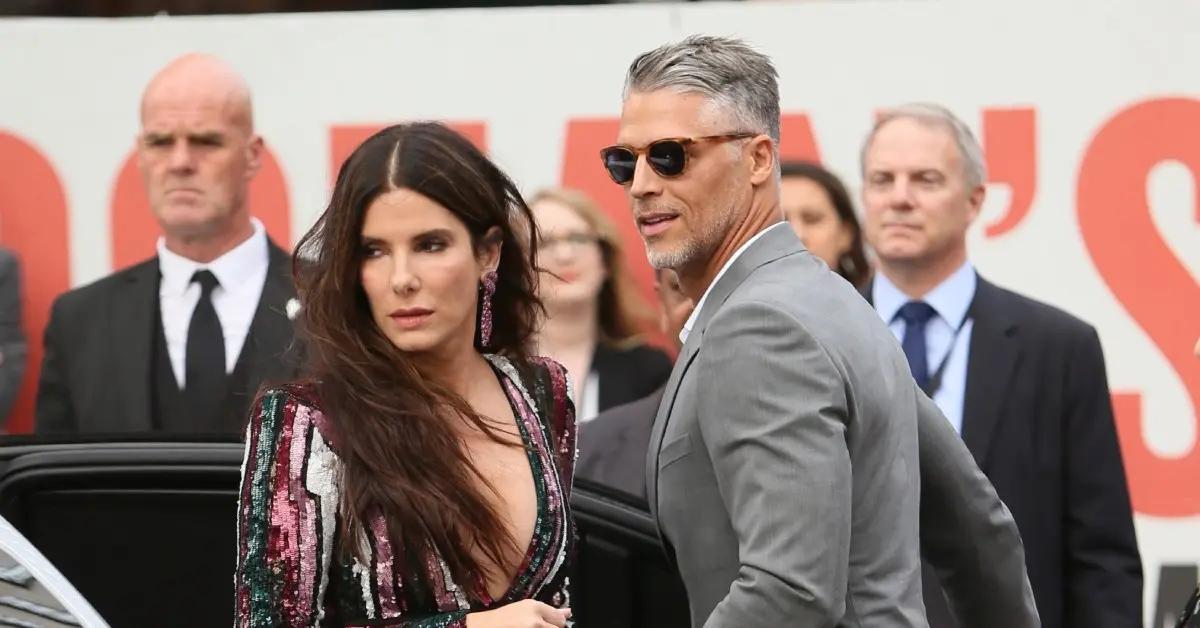 smiley sandra bullock lakers game partner bryan randall death photos