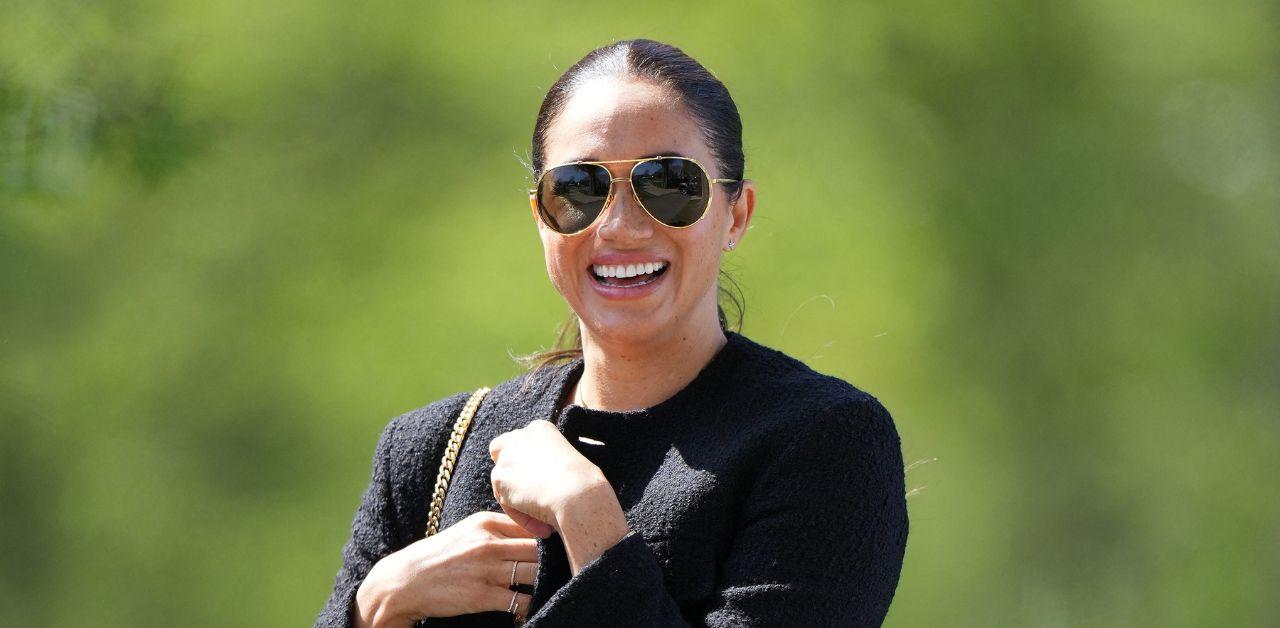 meghan markle become woman of the year press war