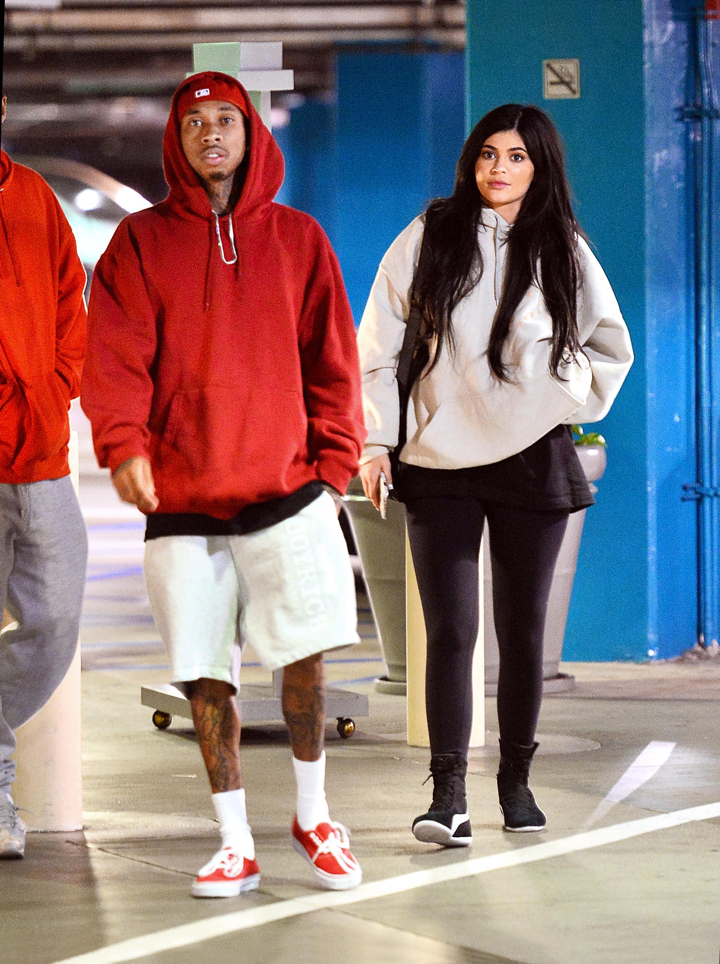 EXCLUSIVE: **PREMIUM RATES APPLY** Kylie Jenner and Tyga show PDA during a movie date night in Los Angeles, CA.