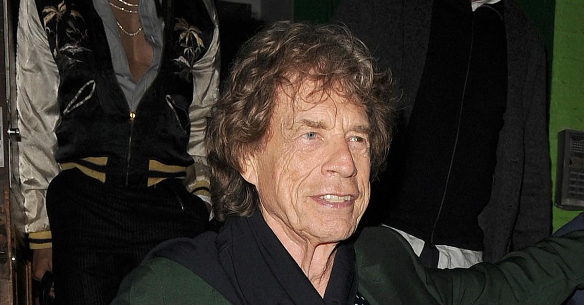 Mick Jagger Assisted By Security While Leaving 80th Birthday Party