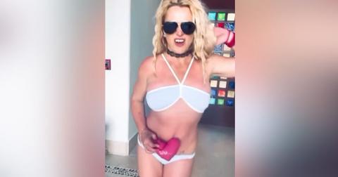 Britney Spears Dances In Baby Blue Bathing Suit In Bizarre Video