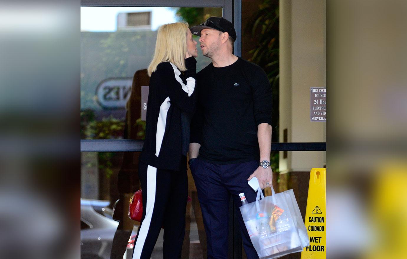 EXCLUSIVE: Donnie Wahlberg and Jenny McCarthy leave a doctors office looking delighted.