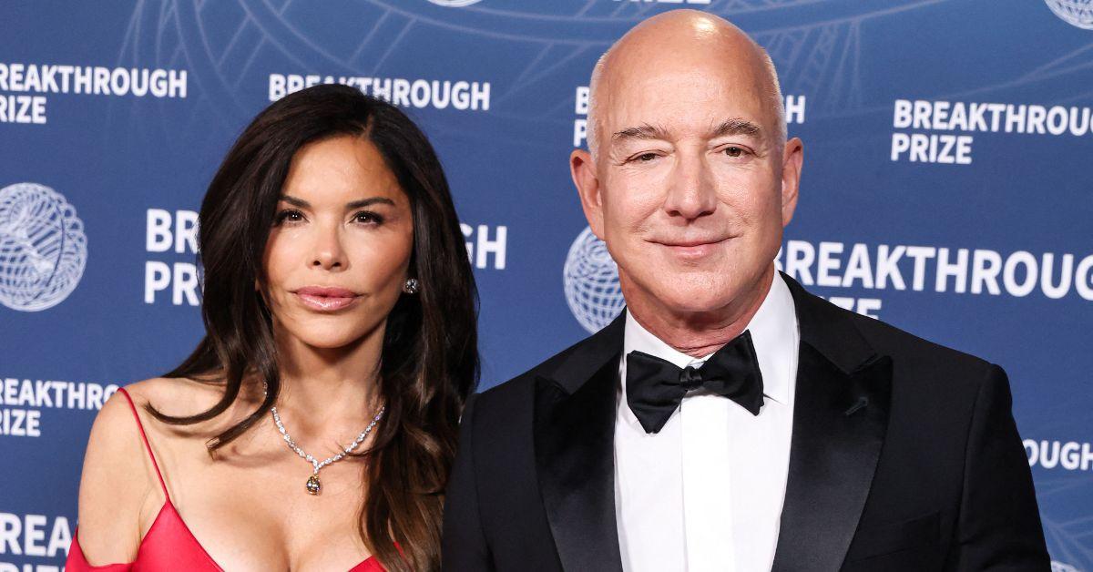image of Jeff Bezos helped her walk on shore as she struggled.