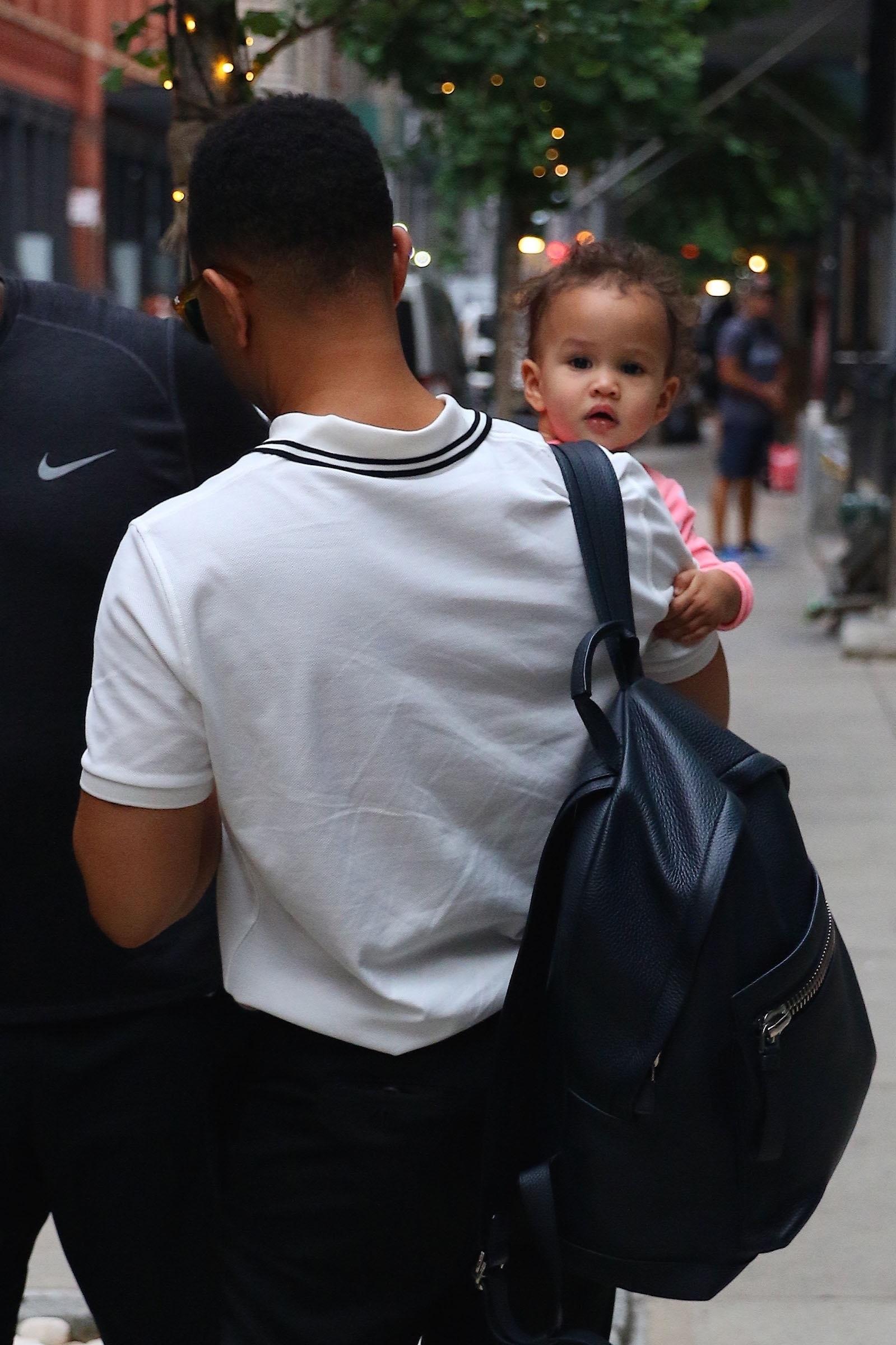 Chrissy Teigen &amp; John Legend check out of their hotel in New York