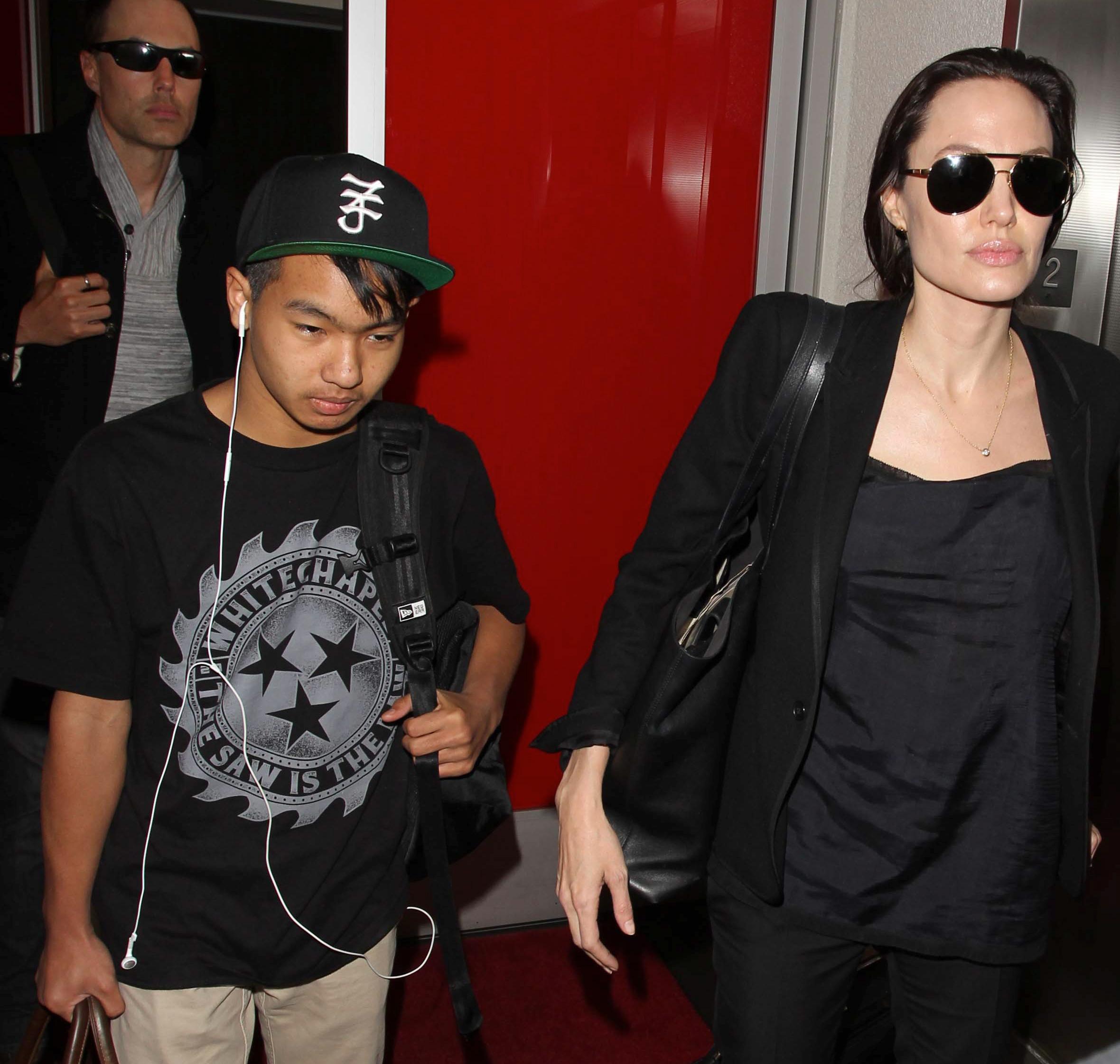 Angelina Jolie and her son Maddox Jolie-Pitt arriving at LAX