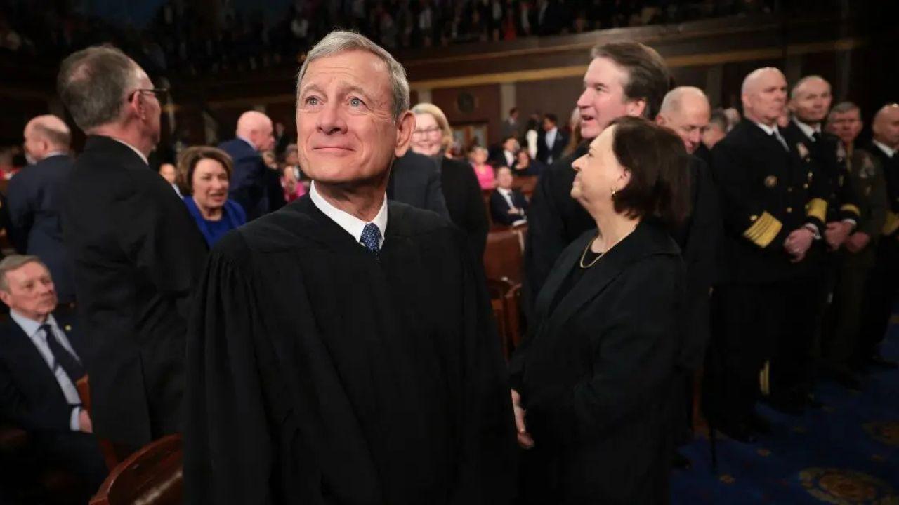 Image of Protesters claimed that they wanted to highlight how John Roberts kept putting Donald Trump above the law.