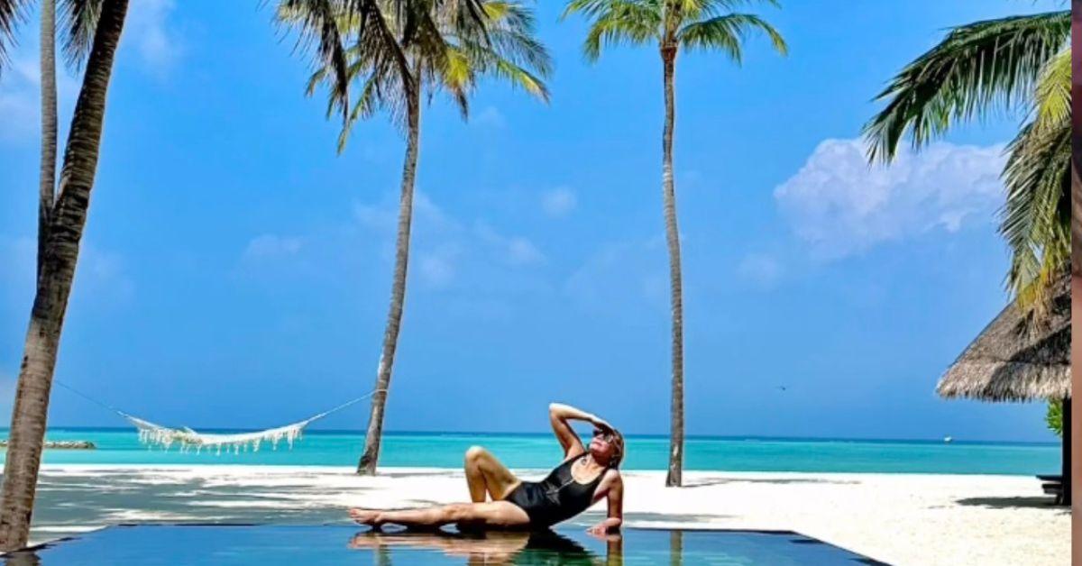 image of Kim Cattrall soaked up the sun on her honeymoon.