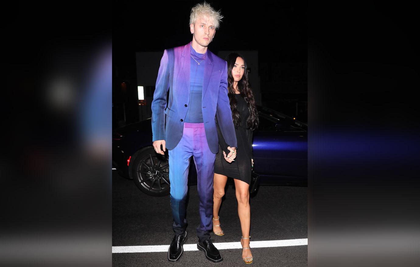 megan fox and machine gun kelly walk hand in hand as they head to the nice guy restaurant to party