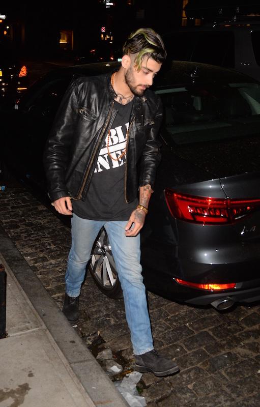 Gigi Hadid, Bella Hadid and Mohamed Hadid and Zayn Malik coming in and out of dinner in soho