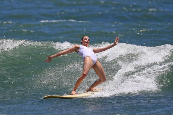 Wipe Out Margot Robbie Takes A Tumble Surfing In See Through White Swimsuit