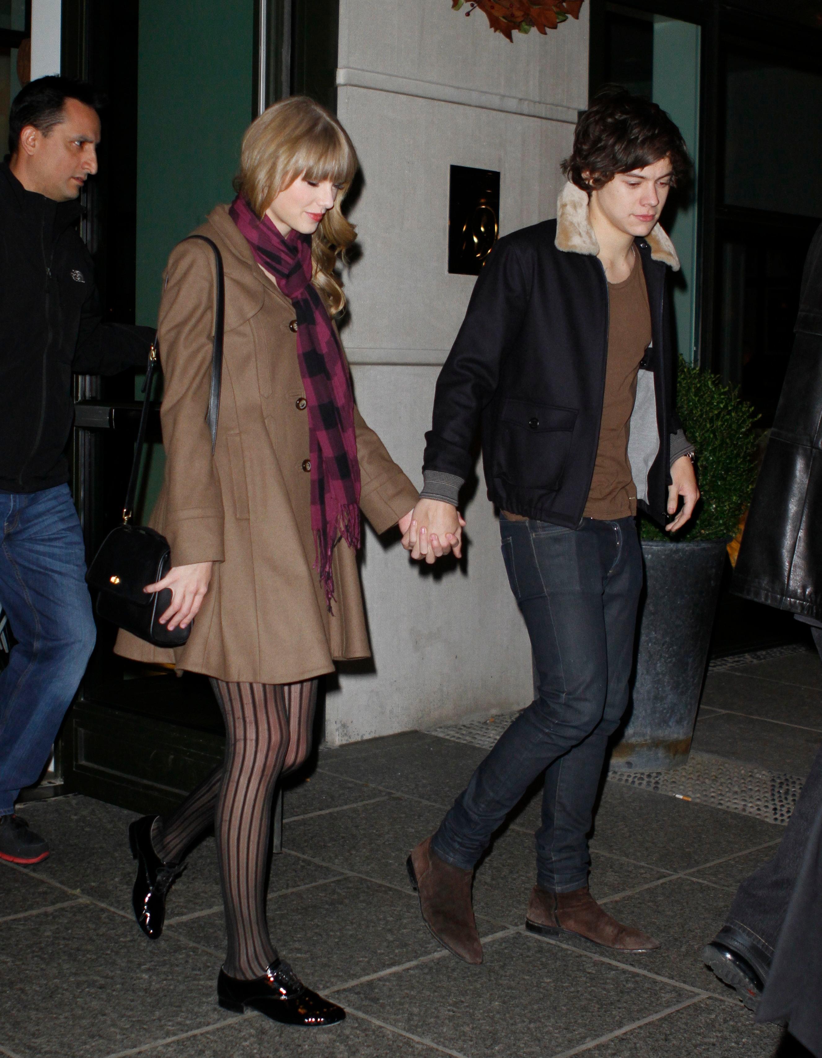 Taylor Swift and Harry Styles hold hands leaving a birthday party in NYC