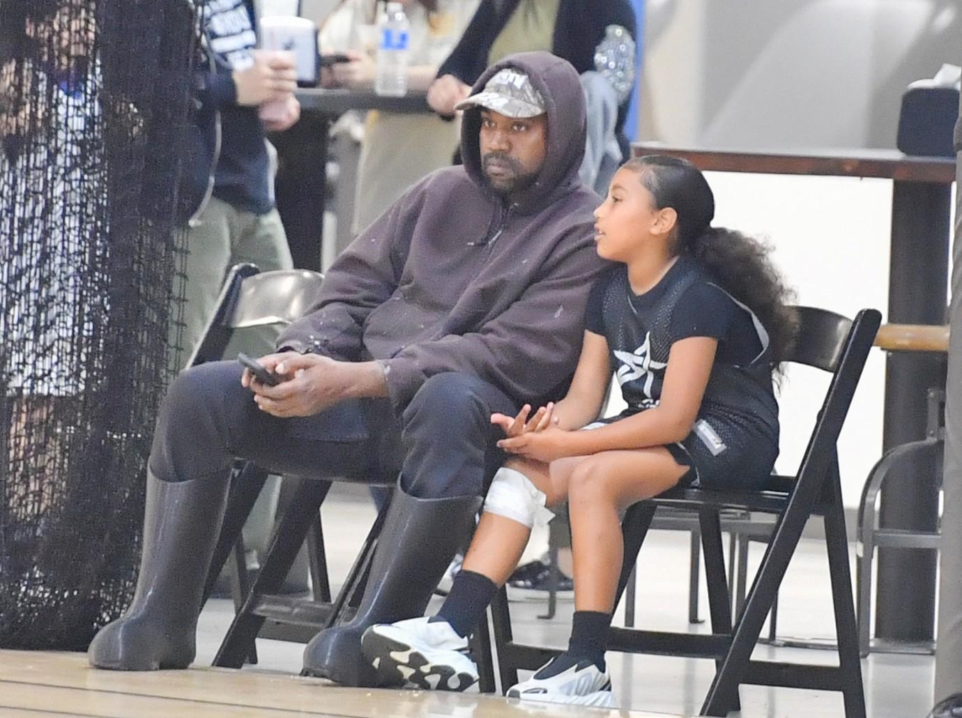 kim kardashian kids ignored kanye west saints soccer game