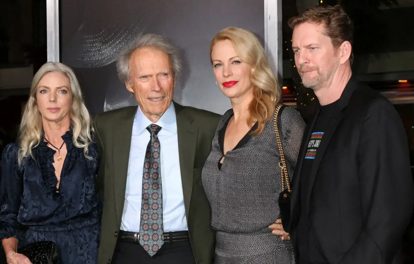 Photo of Clint Eastwood and Christina Sandera at press event.