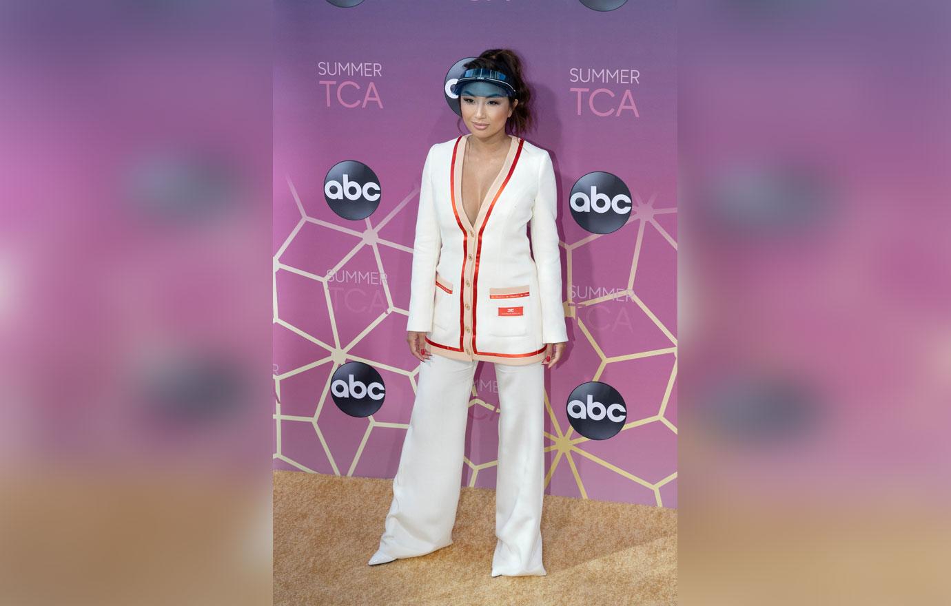 Jeannie Mai Wearing White Pantsuit