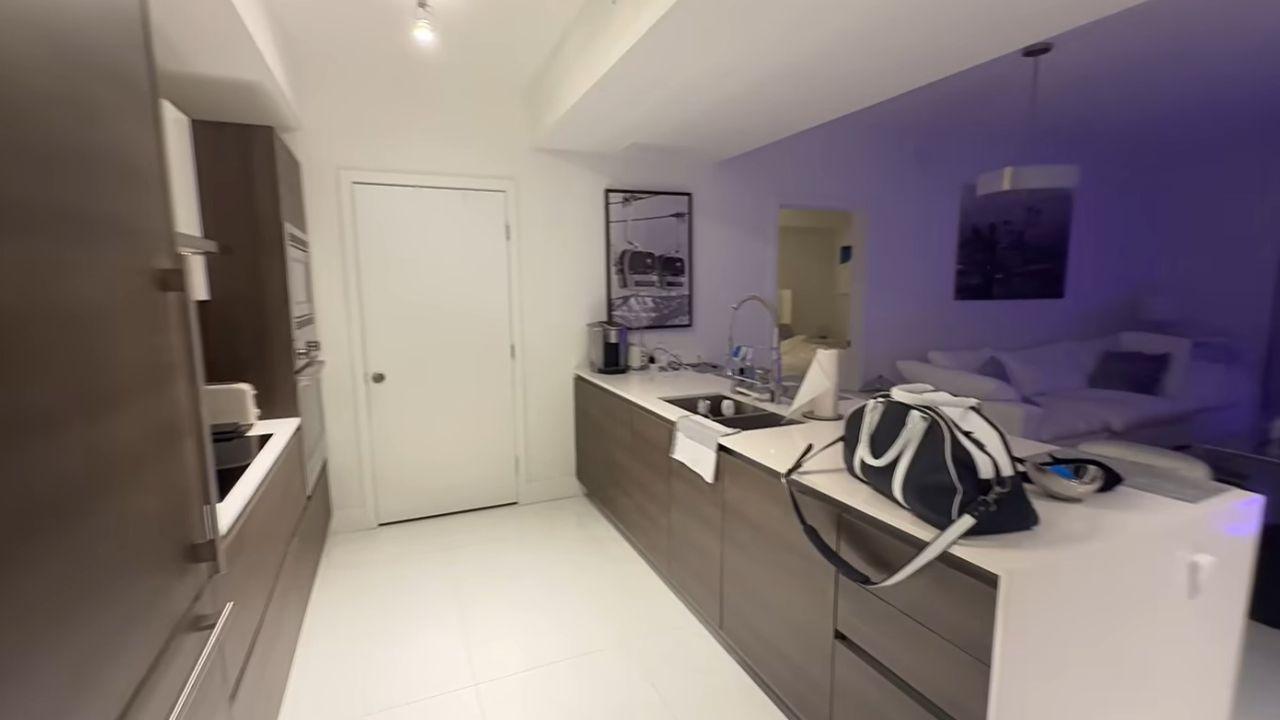 image of Kai Trump showed the kitchen inside her two-bedroom, two-bathroom Miami apartment.