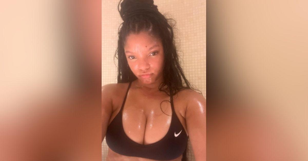 image of The actress wore a black sports bra as she showed off her cleavage.