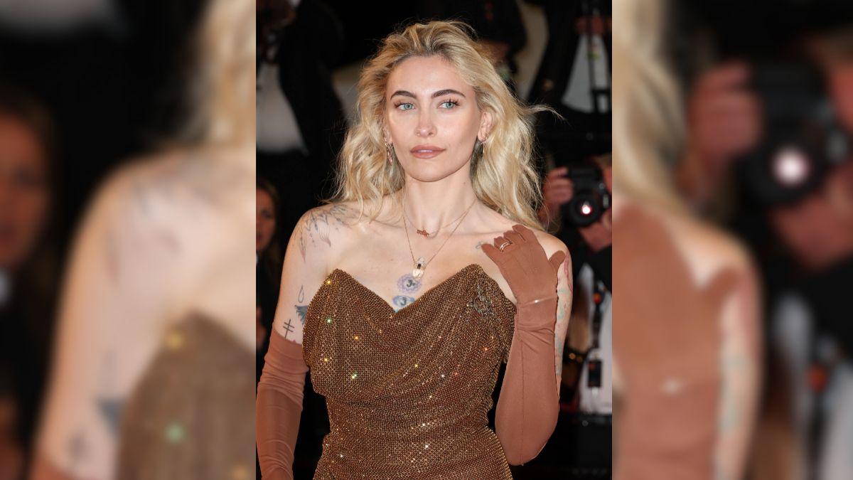 Image of Paris Jackson posed for photos with Hayden Karchmer at the 'Jacka--' premiere.