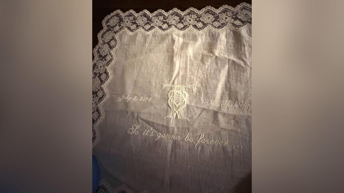 Image of Taylor Swift's lyrics, 'So it's gonna be forever...' were displayed on handkerchiefs provided to guests.