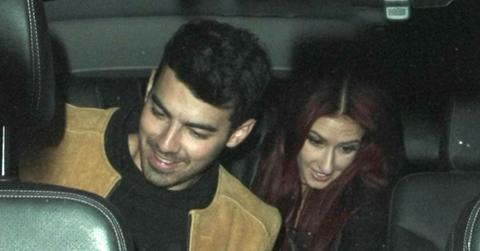 Joe Jonas leaving Craig’s with a mystery woman .