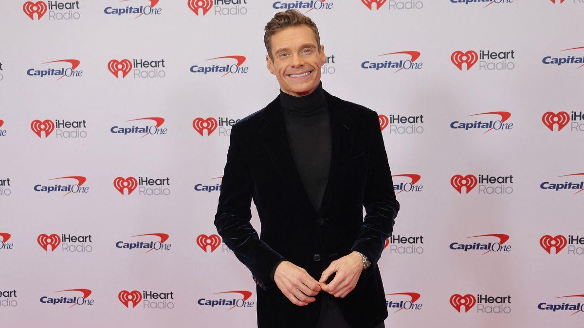 Image of Ryan Seacrest admitted he was kind of torn after a Disney work commitment forced him to miss the wedding.