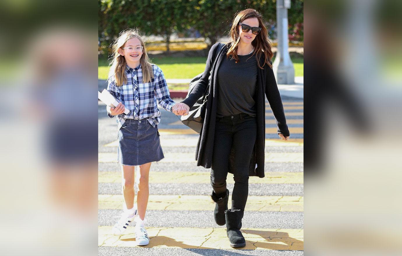 A happy Jennifer Garner takes daughter Violet to a doctors visit