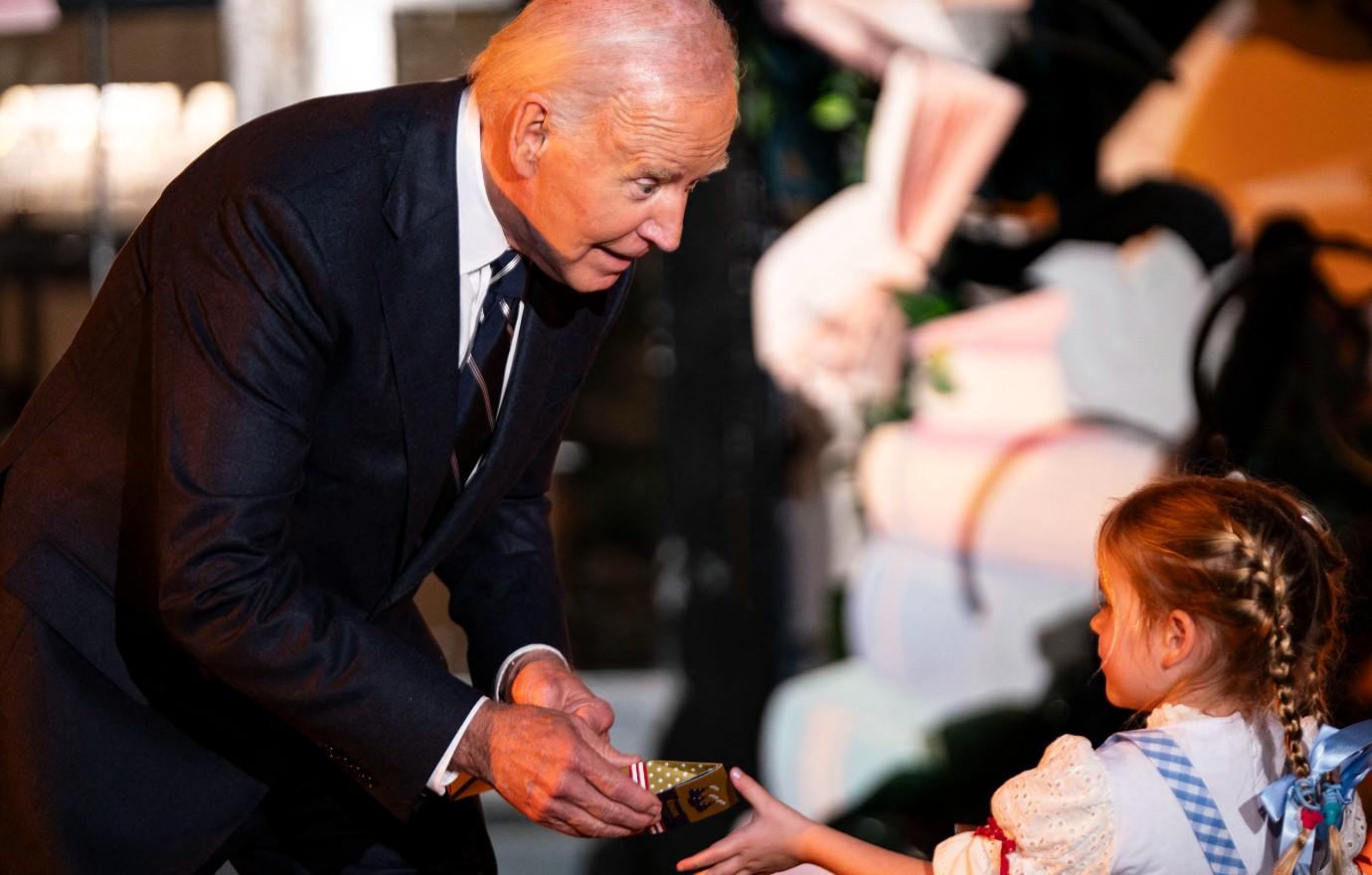 joe biden faces backlash pretending bite babies halloween creepy