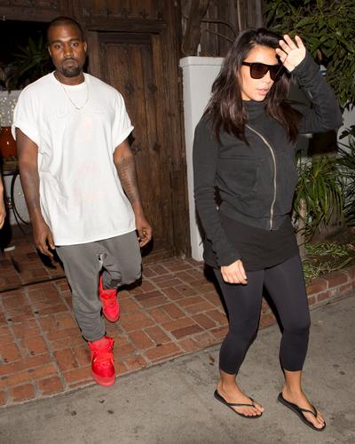 Kim Kardashian and Kanye West fresh back from a tour of Australia were seen leaving ‘The Little Door’ French Restaurant in Los Angeles, CA