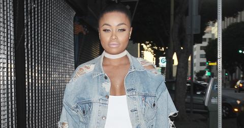 Blac Chyna glows and laughs as she leaves a clothing sale in downtown Los Angeles.