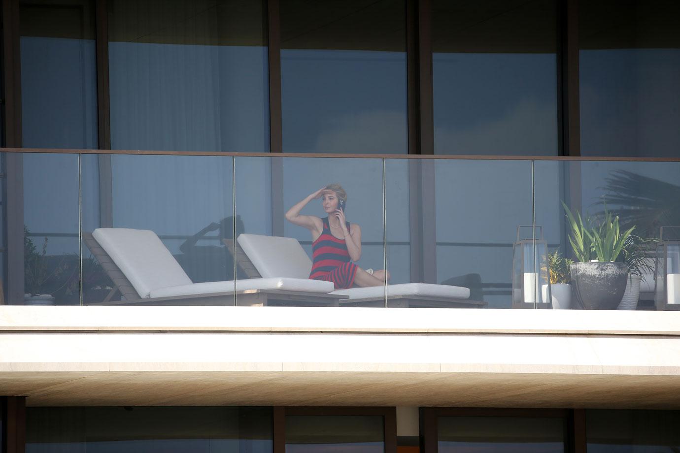 ivanka trump red and black striped dress lunch with son balcony miami