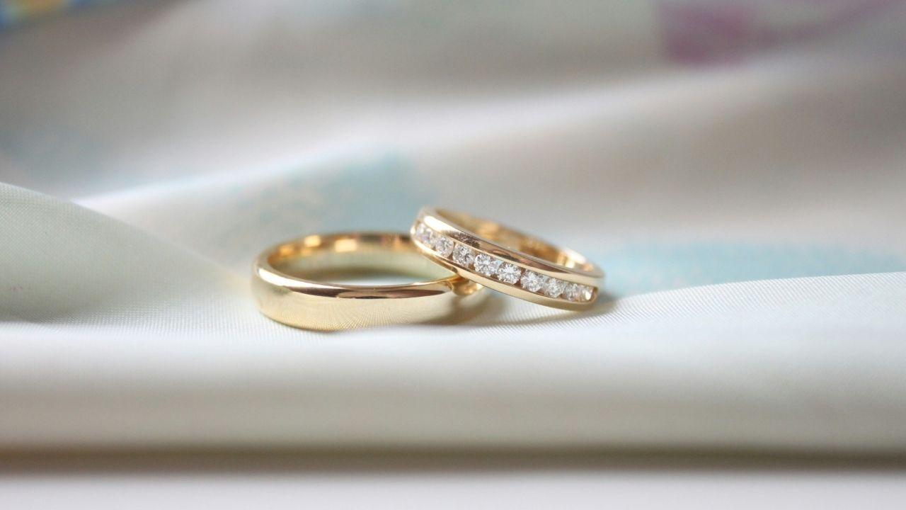 Image of The couple were photographed wearing matching rings on their left hands.