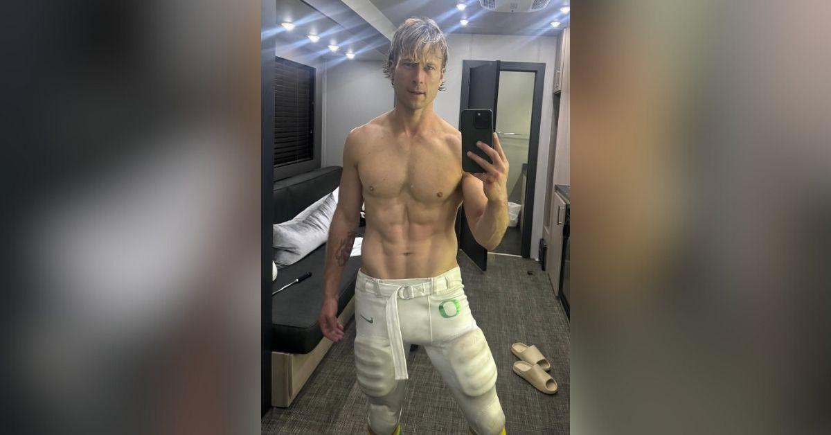 image of Glen Powell showed off his abs in a shirtless behind-the-scenes photo.