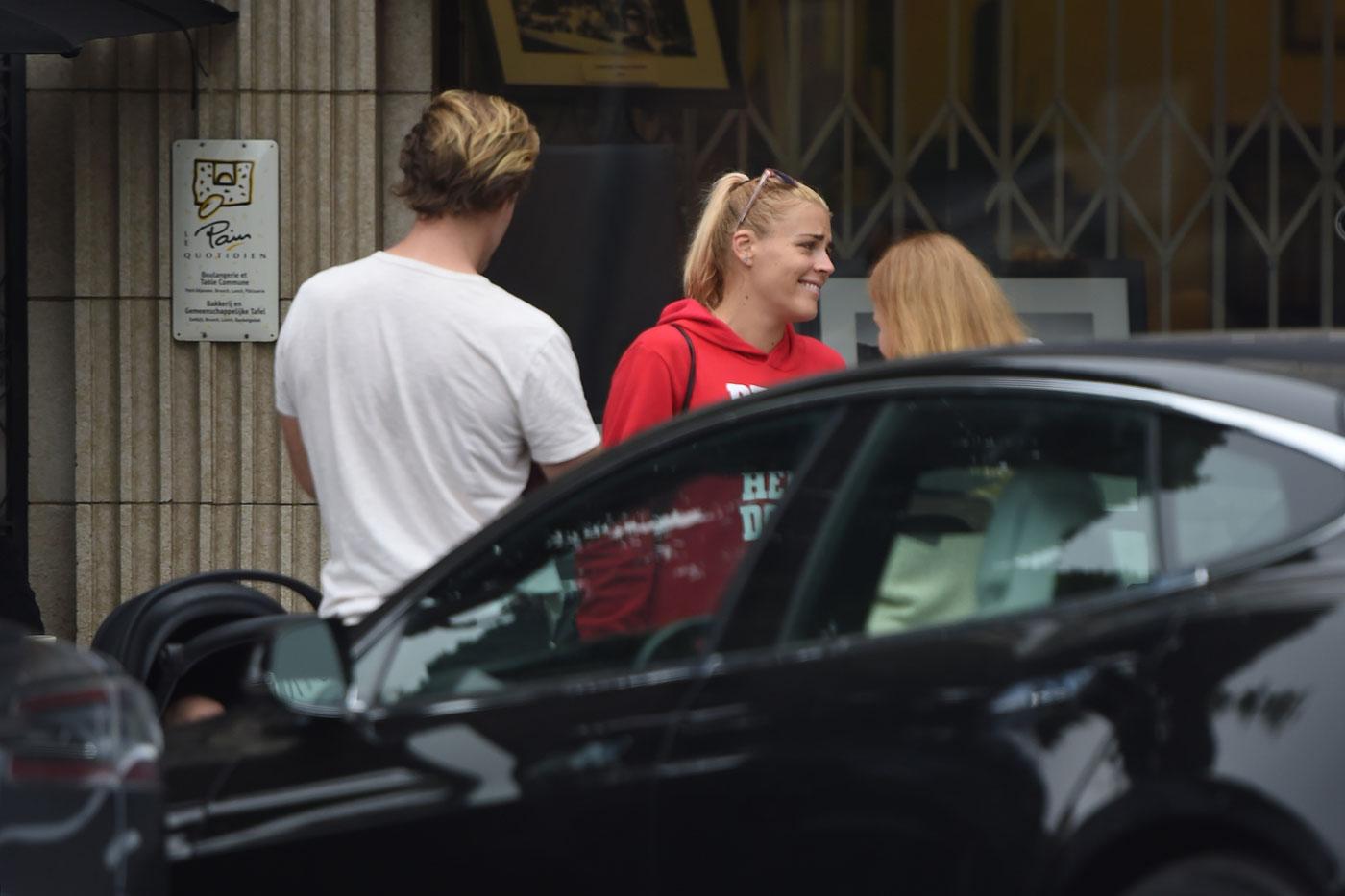 EXCLUSIVE: James Van Der Beek gives Busy Philipps a hug as they chat outside a cafe