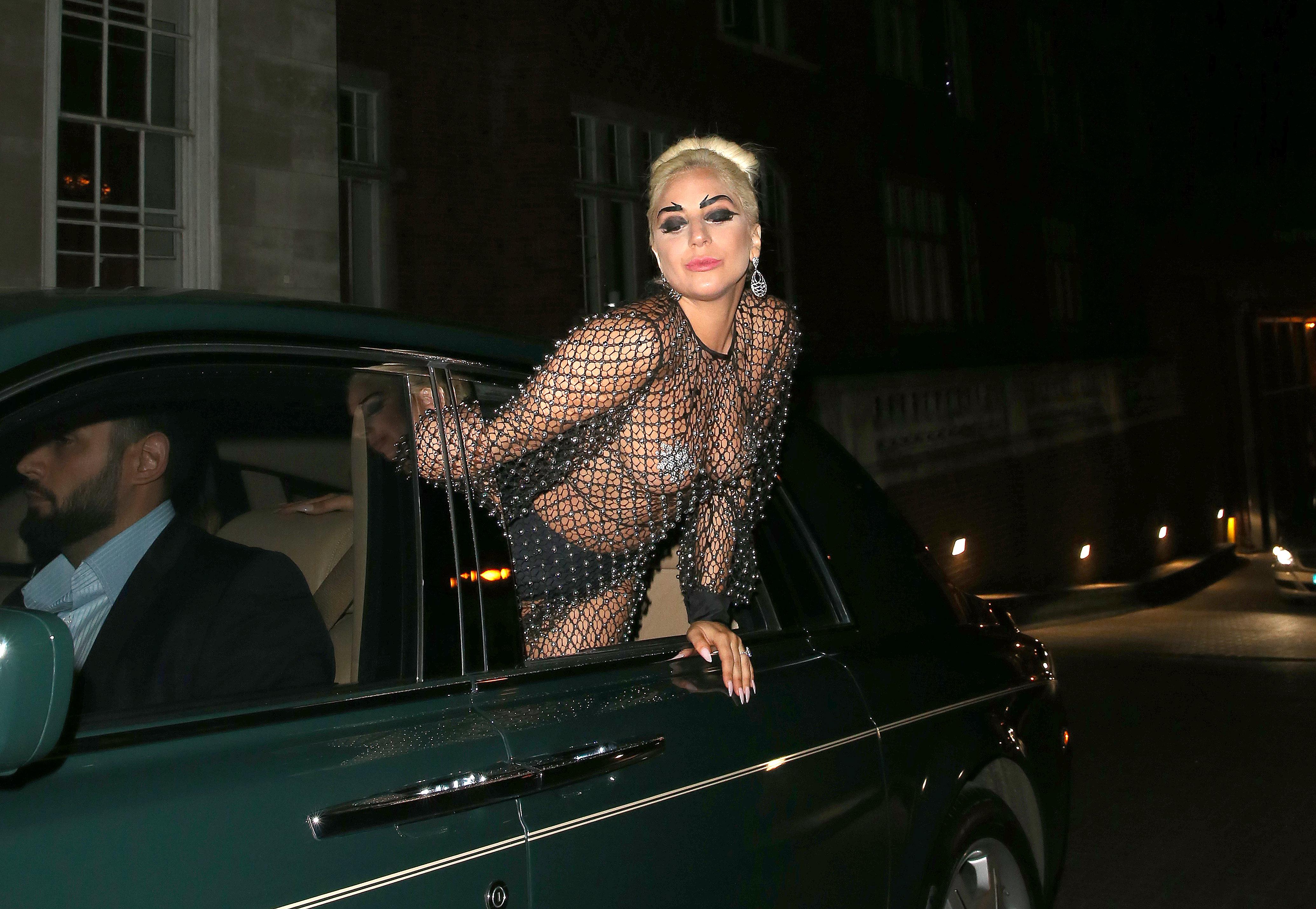 Lady Gaga Leaves The Royal Albert Hall Hanging Out Of Her Car Window