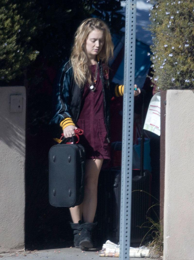 EXCLUSIVE: **PREMIUM EXCLUSIVE RATES APPLY** Billie Lourd leaves her Santa Monica home with rumored boyfriend Taylor Lautner, a day after the death of her mother, Carrie Fisher.