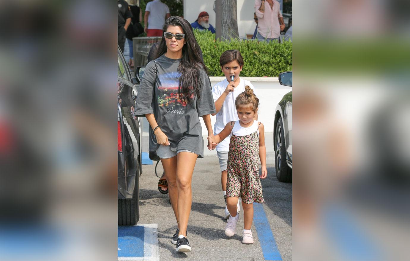 Kourtney Kardashian narrowly misses running into Scott Disick while out with her kids in Malibu, CA