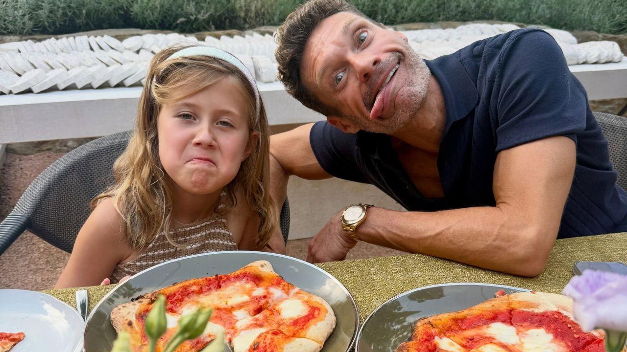 Image of Ryan Seacrest with Flora.