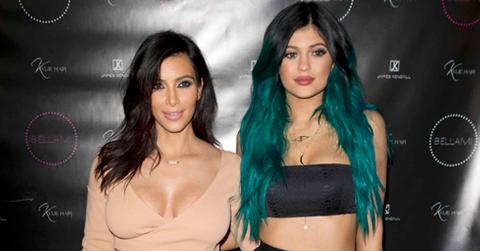 Kylie Jenner poses happily with her sisters on her big hair line extension night launch party LA