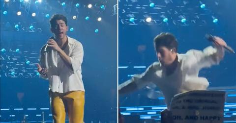 nick jonas falls onstage hole boston concert pops back up watch