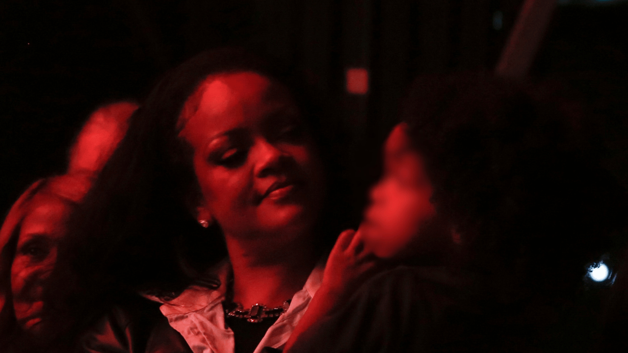 Image of Rihanna flashed a sweet smile at her son as the pair shared a tender moment during the concert.