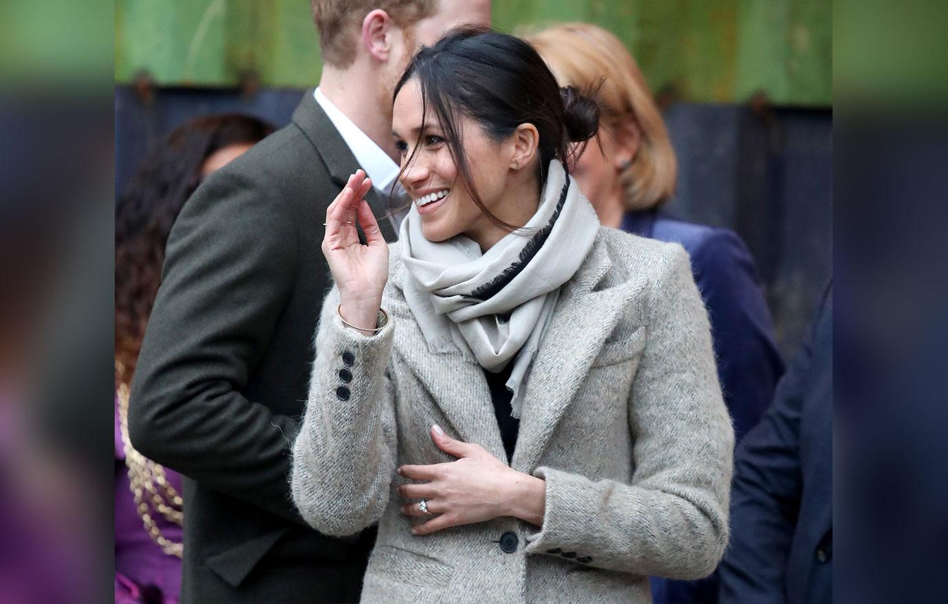 meghan markle pants messy bun prince harry pics 02